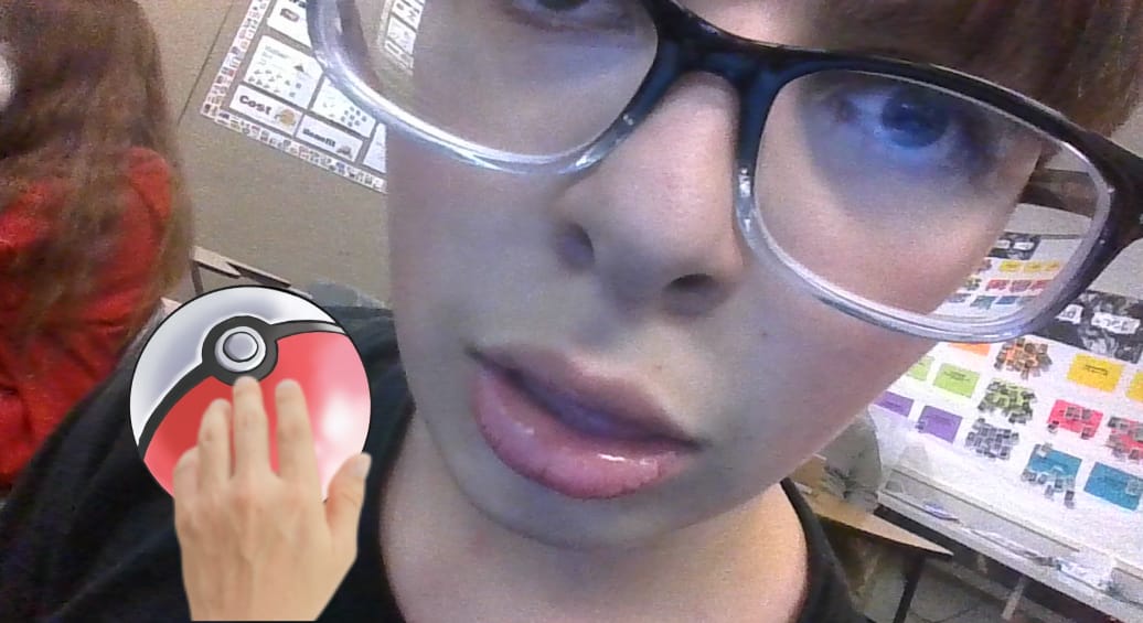 Adrian Cain holding a Pokeball