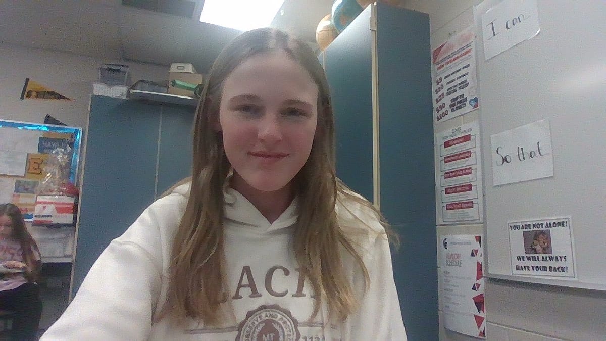 Lucy sitting by the social contract