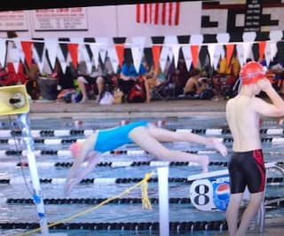 In this photo I'm jumping off the block during the race.